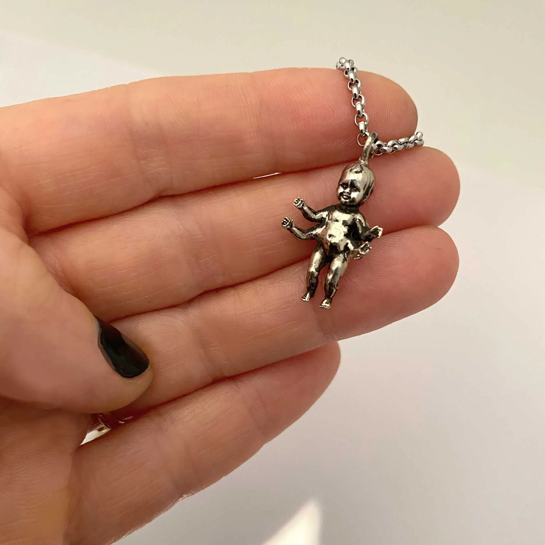 Four Armed Baby Necklace