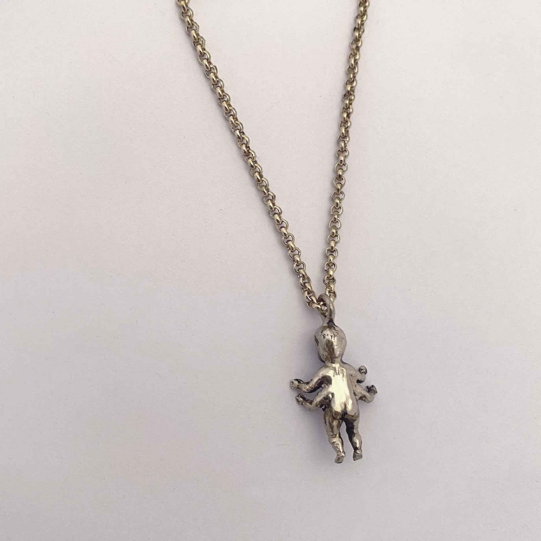 Four Armed Baby Necklace